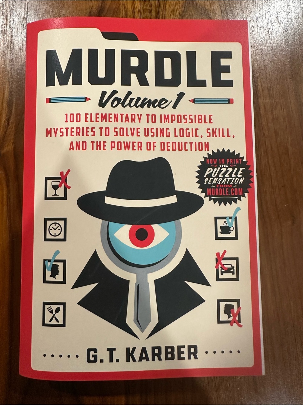 MURDLE Volume 1 Puzzle Book - Red, Cream, Black & Blue Cover